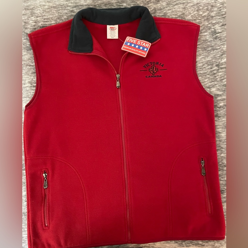 Women’s XL deep red fleece vest with Victoria, BC logo. NWT.  Smoke free home.